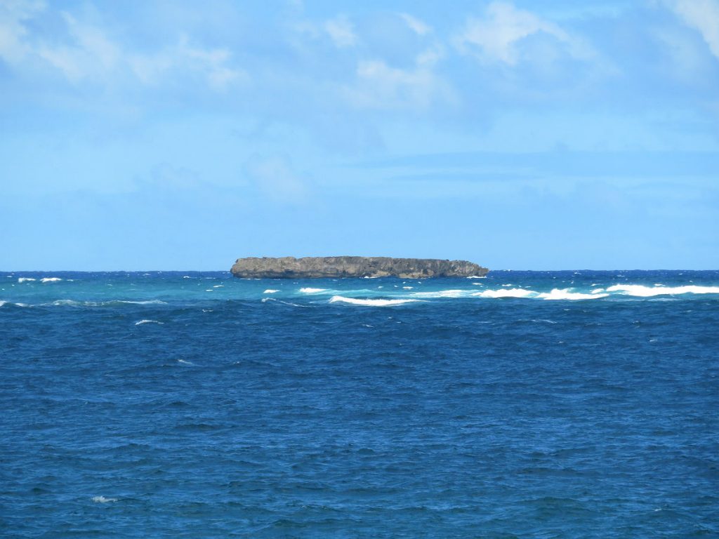 Following the Kamehameha Highway along the northeast coast of Oahu, Hawaii. Sandy beaches, rocky coastlines, scenic islands, mountains, rain forests, sunshine and storm clouds all come together. - photos by Joe Alexander