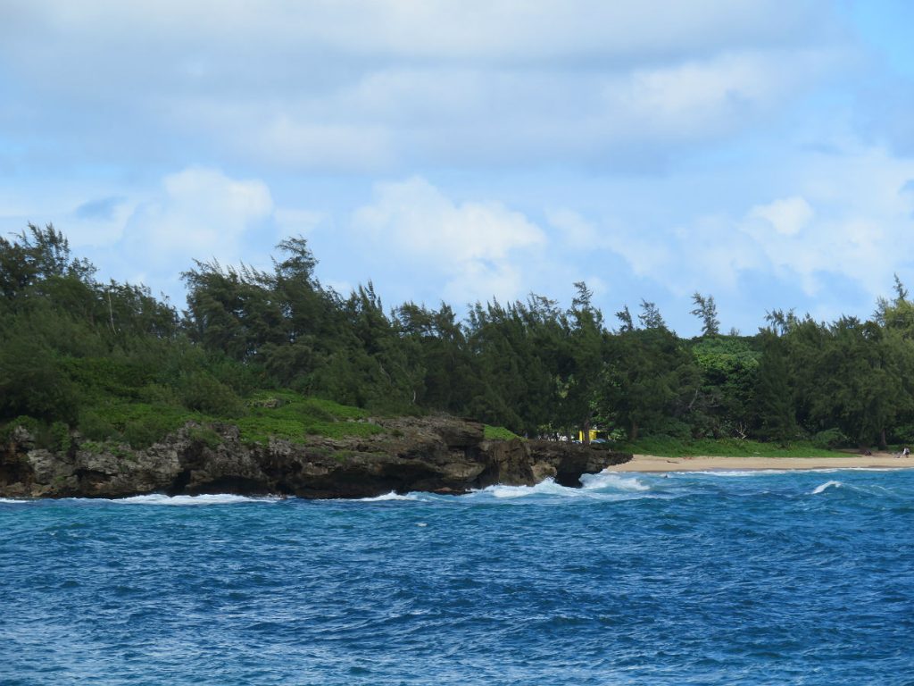Following the Kamehameha Highway along the northeast coast of Oahu, Hawaii. Sandy beaches, rocky coastlines, scenic islands, mountains, rain forests, sunshine and storm clouds all come together. - photos by Joe Alexander