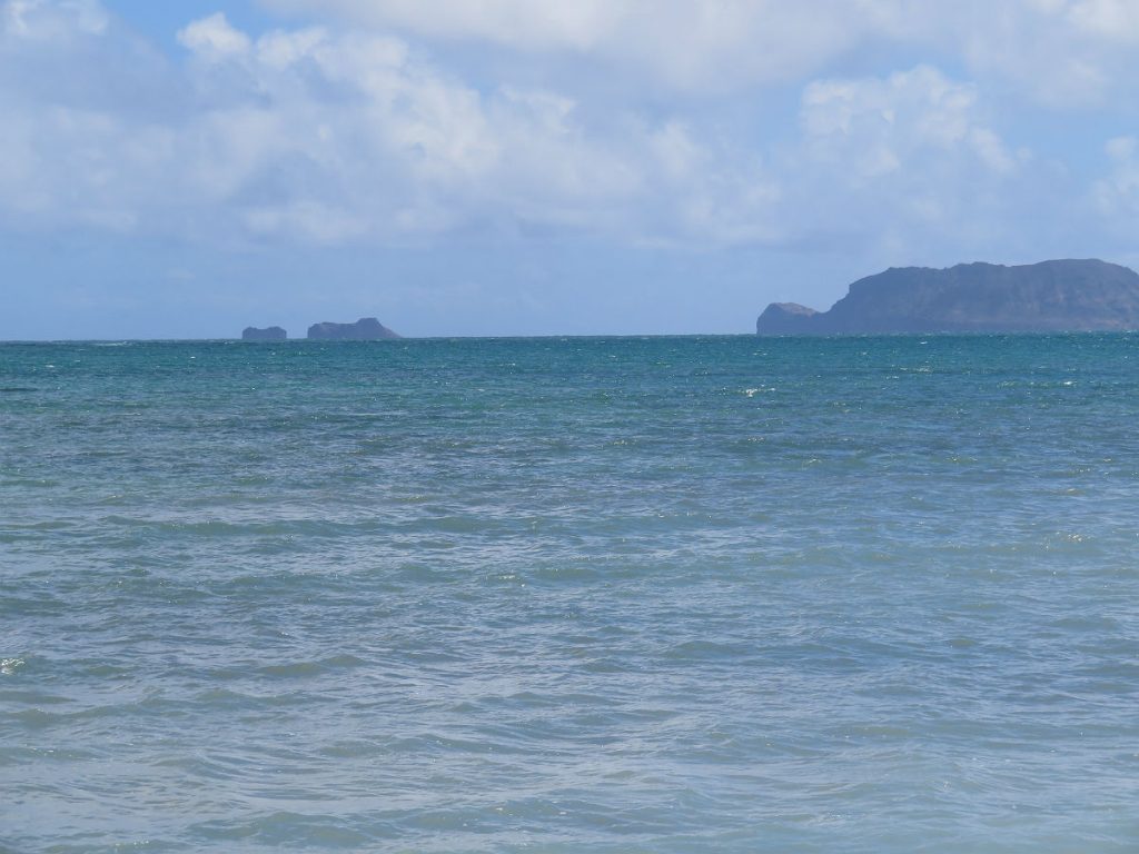 Following the Kamehameha Highway along the northeast coast of Oahu, Hawaii. Sandy beaches, rocky coastlines, scenic islands, mountains, rain forests, sunshine and storm clouds all come together. - photos by Joe Alexander