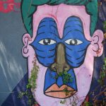 There are lots of murals in Miami, Florida. Some of the murals look back at you. Here are the faces. - photos by Joe Alexander