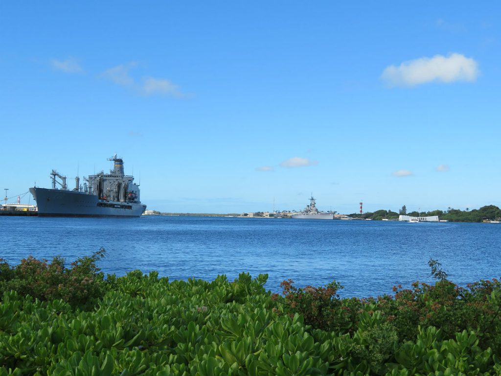 The Battleship Missouri and USS Arizona Memorial are at center stage at Pearl Harbor with the red-and-white World War II control tower in the background and the USS Bowfin submarine nearby. - photos by Joe Alexander
