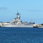 The Battleship Missouri and USS Arizona Memorial are at center stage at Pearl Harbor with the red-and-white World War II control tower in the background and the USS Bowfin submarine nearby. - photos by Joe Alexander