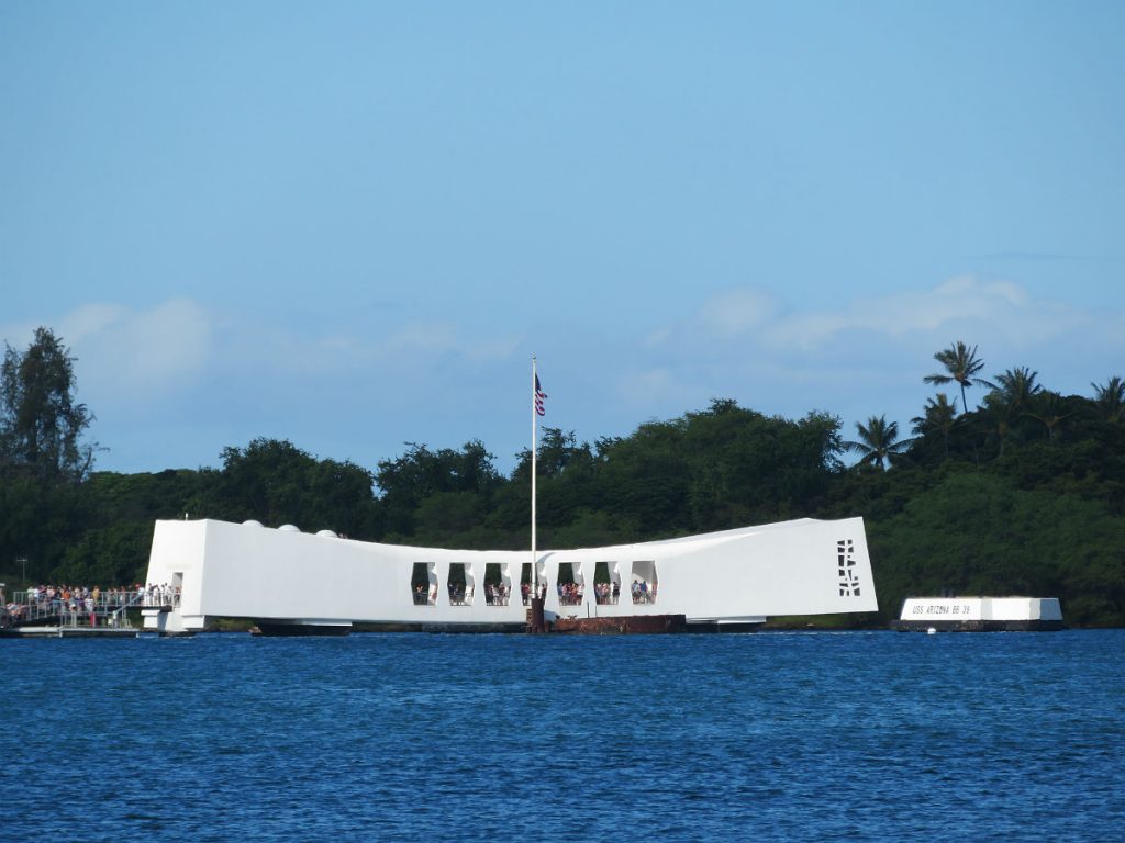 The Battleship Missouri and USS Arizona Memorial are at center stage at Pearl Harbor with the red-and-white World War II control tower in the background and the USS Bowfin submarine nearby. - photos by Joe Alexander
