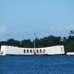 The Battleship Missouri and USS Arizona Memorial are at center stage at Pearl Harbor with the red-and-white World War II control tower in the background and the USS Bowfin submarine nearby. - photos by Joe Alexander