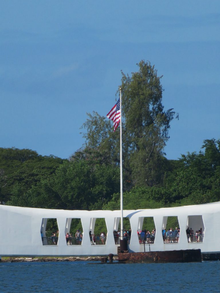 The Battleship Missouri and USS Arizona Memorial are at center stage at Pearl Harbor with the red-and-white World War II control tower in the background and the USS Bowfin submarine nearby. - photos by Joe Alexander