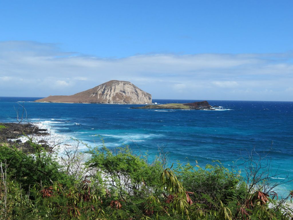 The dramatic meeting of old volcanoes and Pacific waves shape the windward beaches of Oahu, Hawaii. - photos by Joe Alexander