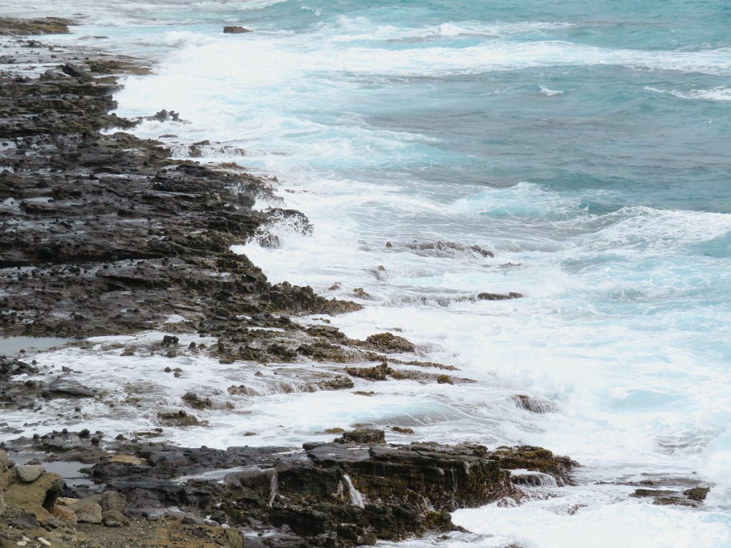 The dramatic meeting of old volcanoes and Pacific waves shape the windward beaches of Oahu, Hawaii. - photos by Joe Alexander