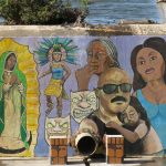 Murals turn a dam into art at Elmendorf Lake on the West Side of San Antonio.