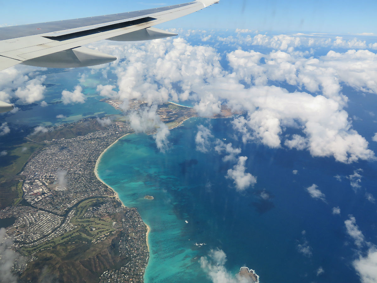 After hours of seeing nothing but sea and sky, you suddenly see the coast of Oahu as you fly into Honolulu. - photos by Joe Alexander