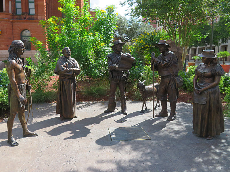 The bronze statues making up The Founders Monument stand near the Bexar County Courthouse in downtown San Antonio. - photo by Joe Alexander