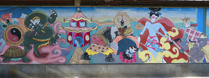 There are a number of brightly colored murals in Boston's Chinatown. - photo by Joe Alexander